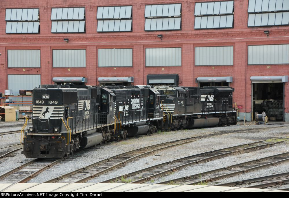 NS 1849, 5348, 7329 in front of the shops